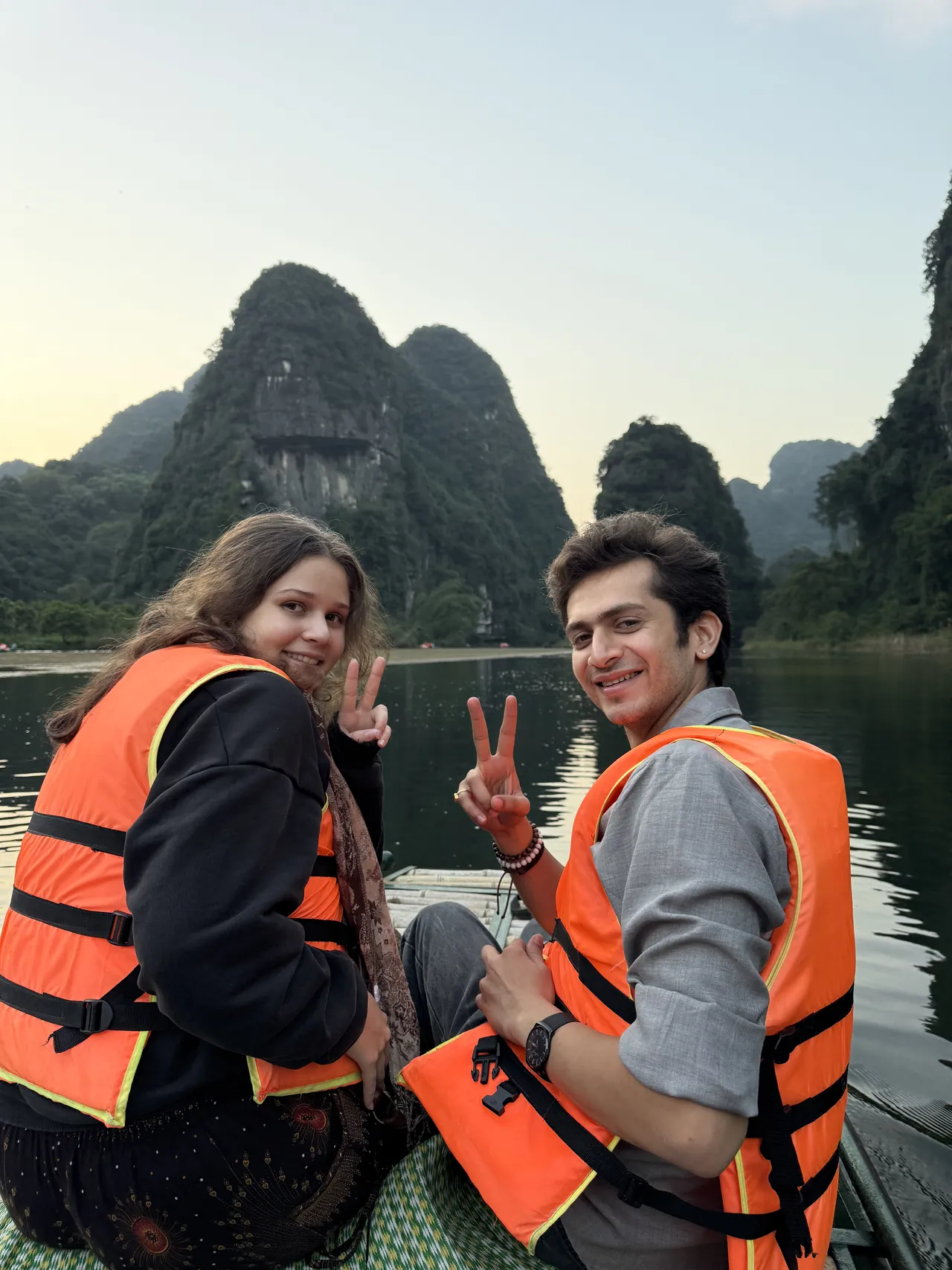 Boat ride between the karsts of Trang An, Ninh Binh